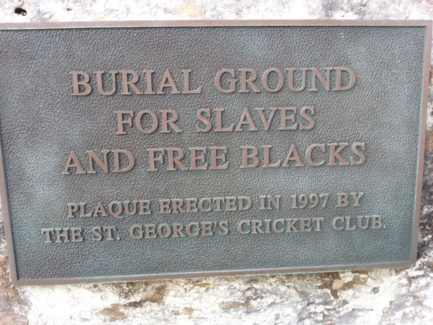 The placque at the entry to the lave and freed blacks cemetery. The placque reads, Burial Ground for Slaves and Free Blacks. Plaque Erected in 1997 by the St. George's Cricket Club