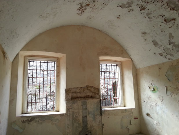A cell in Casemates prison, made from limestone. There were never glass windows on this building.