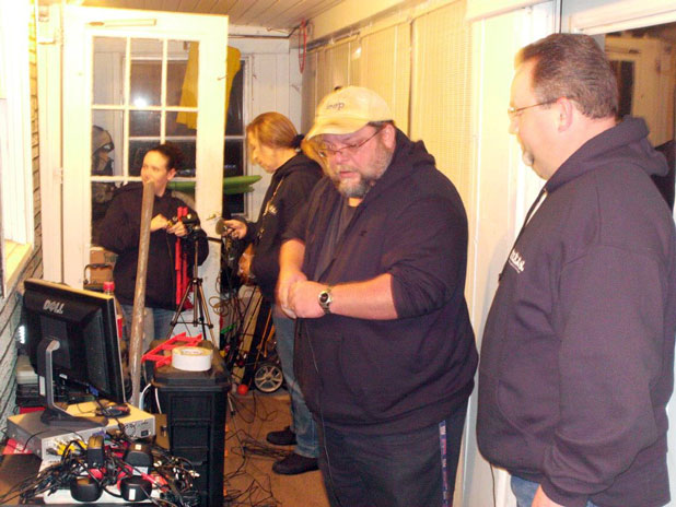 Kellie, Karen, Tom and Mike setting up for the investigation of the Merrill Family home